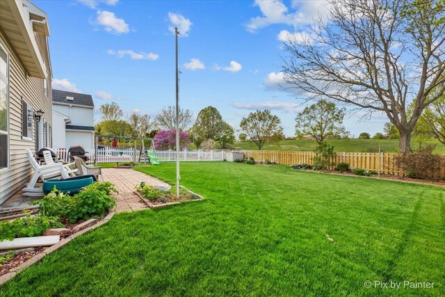 view of yard with a patio area