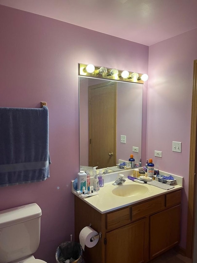 570 Timber Dr, Harvard, IL 60033 - half bath featuring toilet and vanity