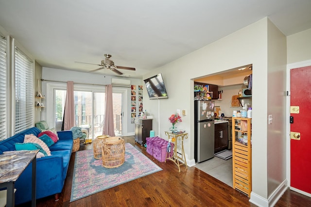 213 W Wisconsin St, Chicago, IL 60614 - living room with wood finished floors, a wall mounted AC, ceiling fan, and baseboards