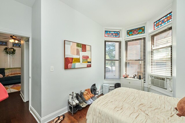 213 W Wisconsin St, Chicago, IL 60614 - bedroom featuring dark wood-style floors, cooling unit, and baseboards
