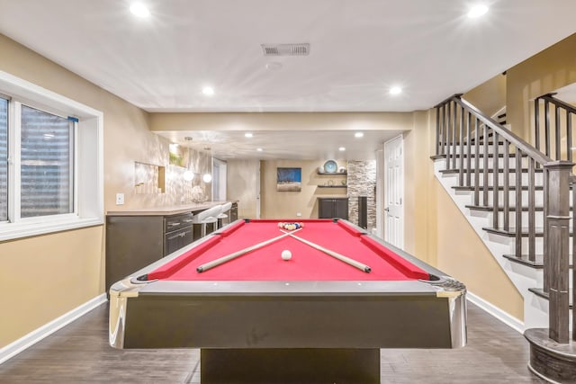 game room with baseboards, wood finished floors, billiards table, bar, and recessed lighting