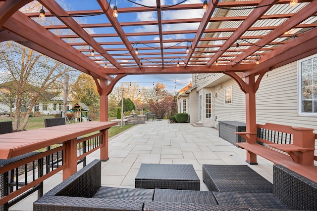 view of patio featuring a playground, outdoor lounge area, and a pergola