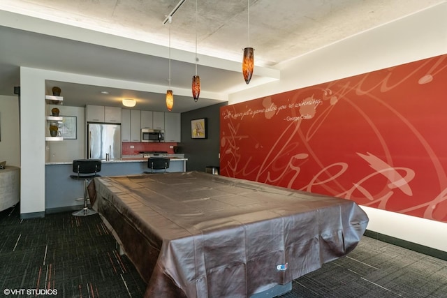 game room with dark carpet, billiards, and baseboards