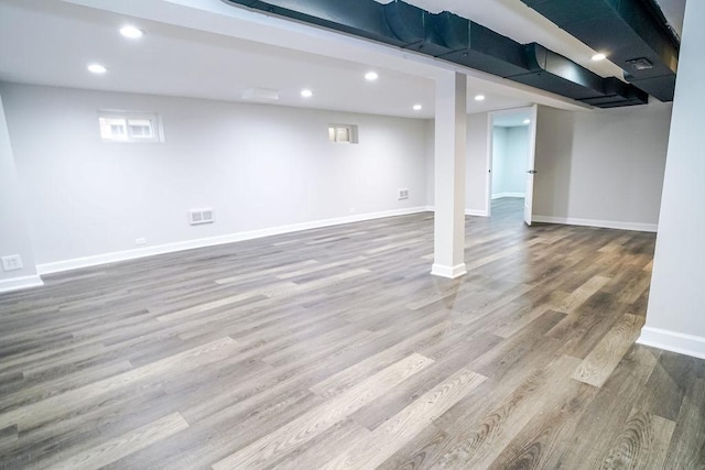 9539 S Forest Ave, Chicago, IL 60628 - basement with wood finished floors, baseboards, and recessed lighting
