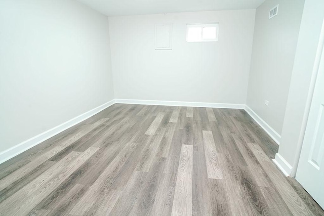 9539 S Forest Ave, Chicago, IL 60628 - spare room with wood finished floors and baseboards