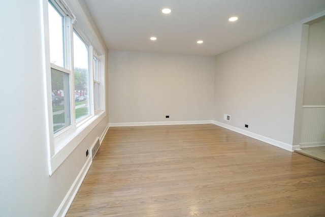 9539 S Forest Ave, Chicago, IL 60628 - unfurnished room featuring light wood-type flooring, recessed lighting, and baseboards