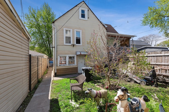 1443 W 49th Pl, Chicago, IL 60609 - rear view of property featuring fence
