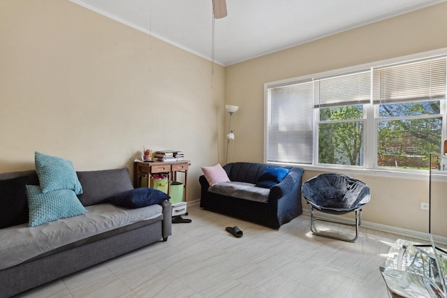 1443 W 49th Pl, Chicago, IL 60609 - living area featuring baseboards, a ceiling fan, and ornamental molding