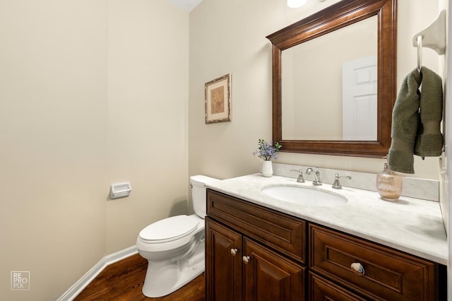 2708 Chittenden Ct, Naperville, IL 60564 - bathroom featuring toilet, vanity, baseboards, and wood finished floors