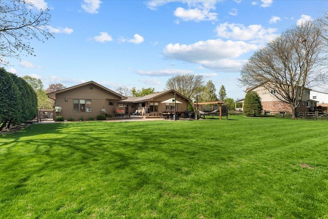208 N Pkwy, Prospect Heights, IL 60070 - view of green lawn with a patio area
