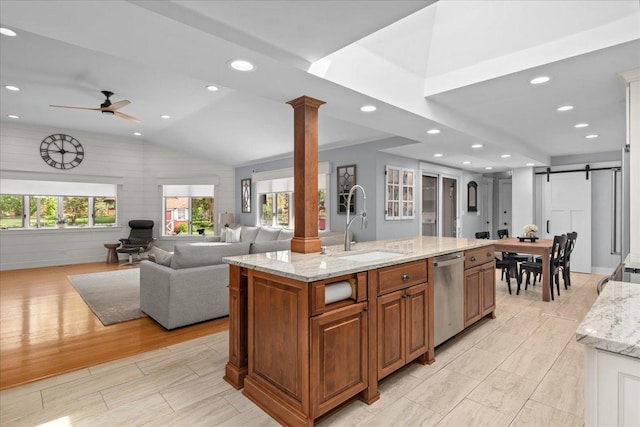 208 N Pkwy, Prospect Heights, IL 60070 - kitchen featuring stainless steel dishwasher, a sink, brown cabinets, a barn door, and recessed lighting