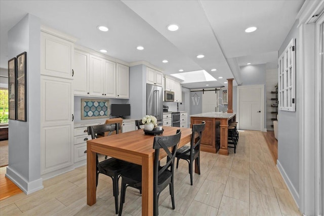 208 N Pkwy, Prospect Heights, IL 60070 - dining room with baseboards, light wood-style floors, and recessed lighting