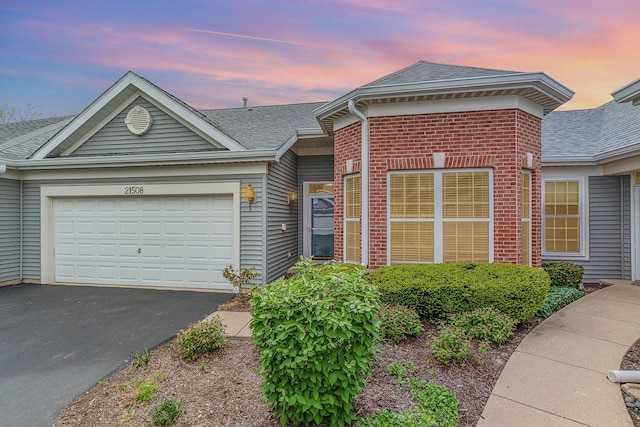 21508 Lake St Clair Dr Unit 0, Crest Hill, IL 60403 - view of front of property with a shingled roof, a garage, driveway, and brick siding