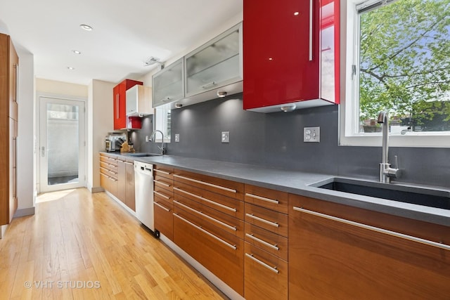 1534 W Henderson St, Chicago, IL 60657 - kitchen with dishwasher, a sink, tasteful backsplash, light wood-style flooring, and recessed lighting