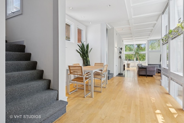 1534 W Henderson St, Chicago, IL 60657 - dining space with light wood-type flooring, stairs, beamed ceiling, and recessed lighting