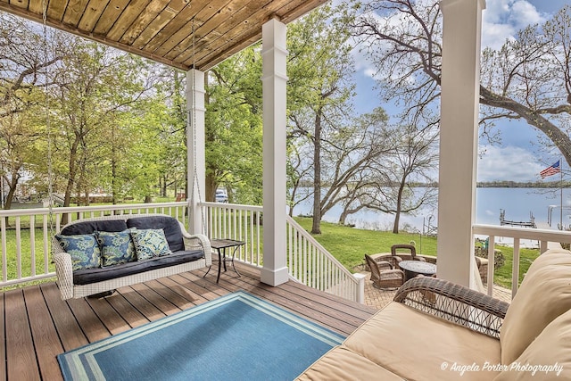 75 N Lake Ave, Third Lake, IL 60030 - wooden terrace featuring outdoor lounge area, a lawn, and a water view