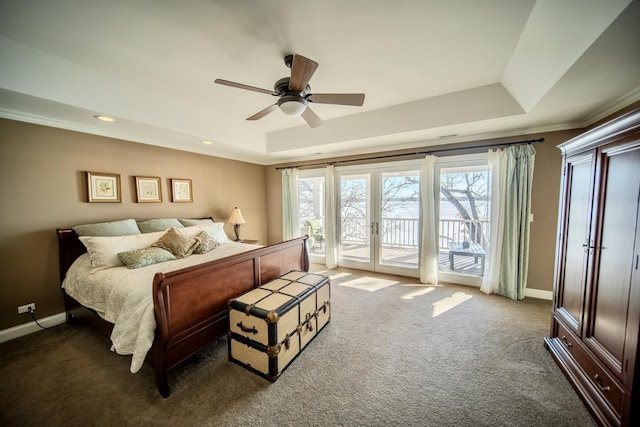75 N Lake Ave, Third Lake, IL 60030 - bedroom featuring a tray ceiling, access to exterior, carpet flooring, baseboards, and ornamental molding