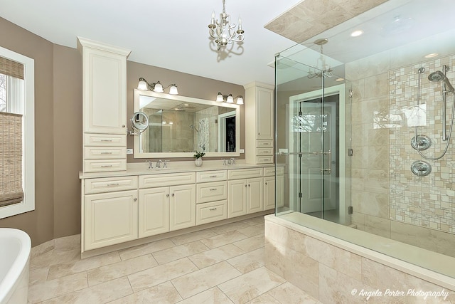 75 N Lake Ave, Third Lake, IL 60030 - full bath featuring a shower stall, a soaking tub, a chandelier, and double vanity