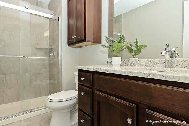 75 N Lake Ave, Third Lake, IL 60030 - bathroom with toilet, a stall shower, and vanity