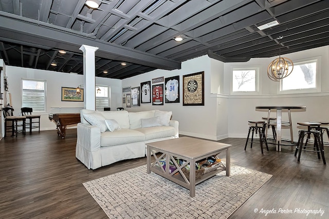 75 N Lake Ave, Third Lake, IL 60030 - living area featuring plenty of natural light, baseboards, a chandelier, and ornate columns
