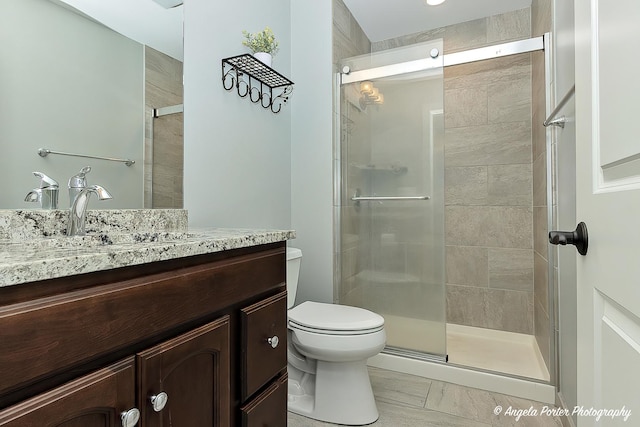 75 N Lake Ave, Third Lake, IL 60030 - bathroom with a shower stall, toilet, and vanity