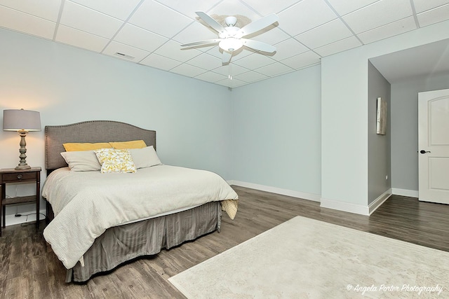 75 N Lake Ave, Third Lake, IL 60030 - bedroom with wood finished floors, baseboards, a paneled ceiling, and a ceiling fan