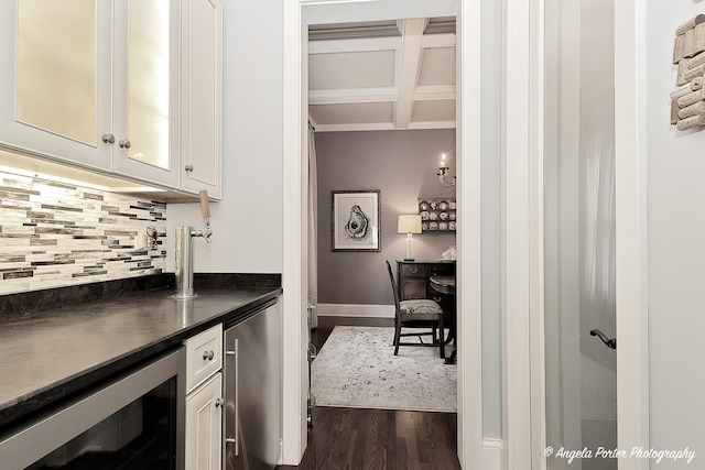 75 N Lake Ave, Third Lake, IL 60030 - indoor dry bar with wine cooler, backsplash, dark wood finished floors, baseboards, and coffered ceiling
