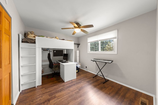 1984 Nottingham Ln, Wheaton, IL 60189 - bedroom with a desk, dark wood-style floors, baseboards, and ceiling fan