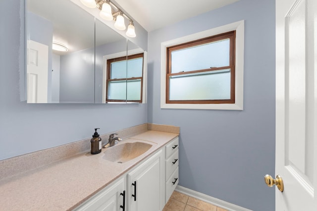 1984 Nottingham Ln, Wheaton, IL 60189 - bathroom featuring tile patterned floors, vanity, and baseboards