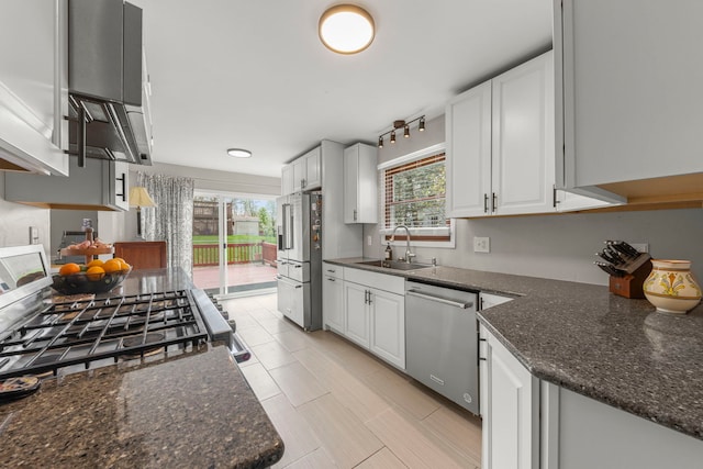 1984 Nottingham Ln, Wheaton, IL 60189 - kitchen with stainless steel appliances, a sink, white cabinetry, and dark stone countertops