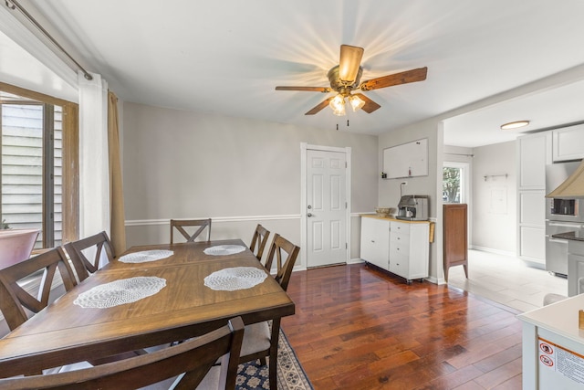 1984 Nottingham Ln, Wheaton, IL 60189 - dining space with hardwood / wood-style flooring, a ceiling fan, and baseboards