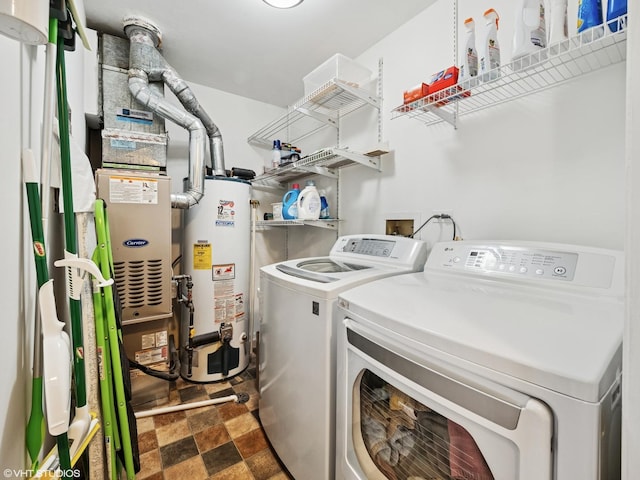 751 Sterling Ct Unit D1, Bartlett, IL 60103 - washroom with water heater, separate washer and dryer, and stone finish flooring