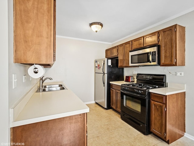 751 Sterling Ct Unit D1, Bartlett, IL 60103 - kitchen with stainless steel microwave, black gas range oven, freestanding refrigerator, light countertops, and crown molding