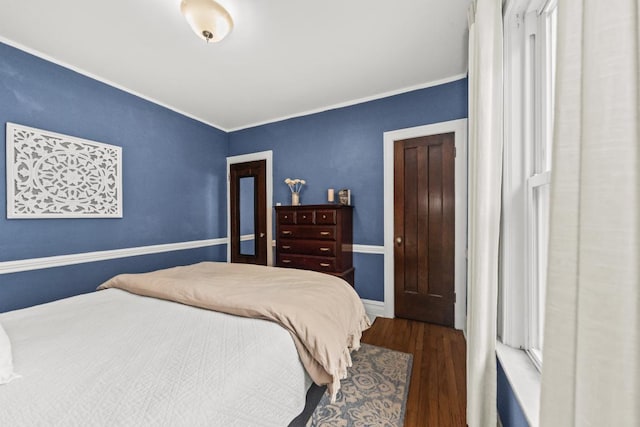 2749 Reese Ave, Evanston, IL 60201 - bedroom featuring wood finished floors, ornamental molding, and baseboards