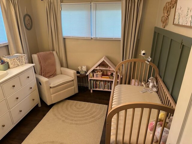 1415 Woodridge Dr, Danville, IL 61832 - bedroom with dark wood-style flooring