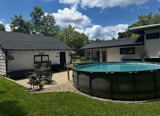 1415 Woodridge Dr, Danville, IL 61832 - swimming pool with a patio and a yard