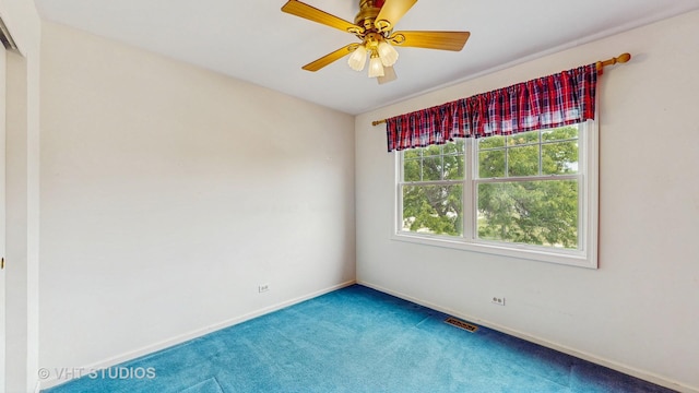 500 Shallow Cove Rd, Lake Zurich, IL 60047 - carpeted spare room with baseboards and a ceiling fan