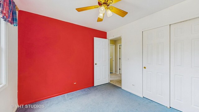 500 Shallow Cove Rd, Lake Zurich, IL 60047 - unfurnished bedroom featuring carpet flooring, a closet, a ceiling fan, and baseboards