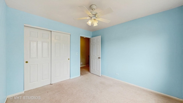 500 Shallow Cove Rd, Lake Zurich, IL 60047 - unfurnished bedroom with carpet floors, a closet, baseboards, and a ceiling fan