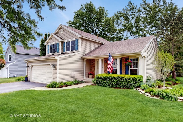 500 Shallow Cove Rd, Lake Zurich, IL 60047 - view of front facade with driveway, a front yard, a garage, and a shingled roof