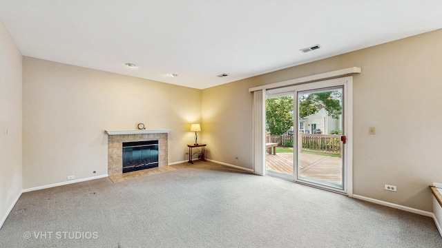 500 Shallow Cove Rd, Lake Zurich, IL 60047 - unfurnished living room featuring a tiled fireplace, baseboards, and carpet flooring