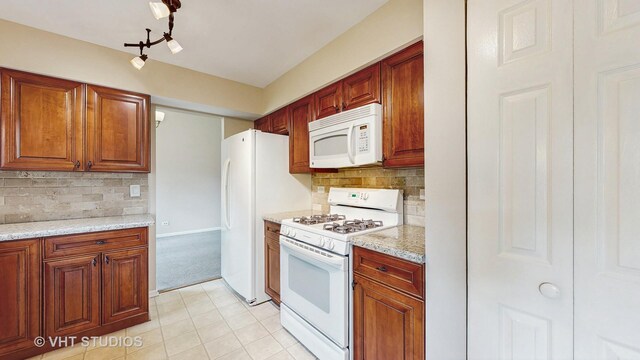 500 Shallow Cove Rd, Lake Zurich, IL 60047 - kitchen with white appliances, tasteful backsplash, light carpet, and brown cabinetry