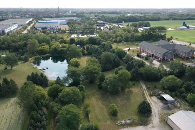 aerial view of property and surrounding area with a large body of water