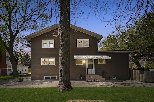 2002 Grove Ave, North Chicago, IL 60064 - back of property featuring a patio