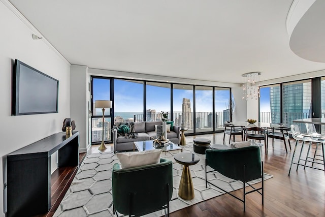 225 N Columbus Dr Unit 6305, Chicago, IL 60601 - living area with a wall of windows, wood finished floors, a chandelier, and a view of city
