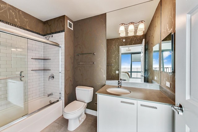 225 N Columbus Dr Unit 6305, Chicago, IL 60601 - full bath featuring tile patterned floors, toilet, vanity, and shower / bath combination with glass door