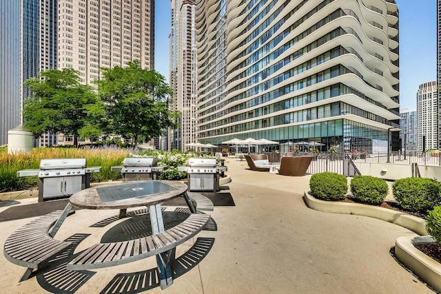 225 N Columbus Dr Unit 6305, Chicago, IL 60601 - view of home's community with outdoor dining space and a patio
