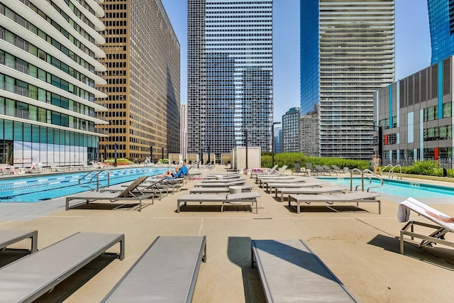 225 N Columbus Dr Unit 6305, Chicago, IL 60601 - community pool with a patio area and a view of city