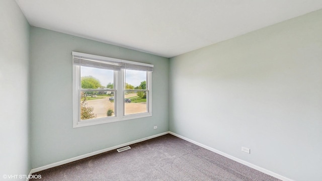 2525 Ridge Rd, Aurora, IL 60504 - carpeted empty room with baseboards