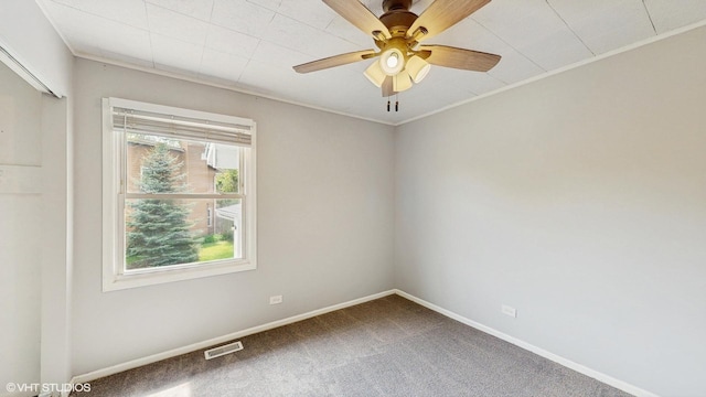 2525 Ridge Rd, Aurora, IL 60504 - carpeted spare room featuring baseboards, ceiling fan, and ornamental molding
